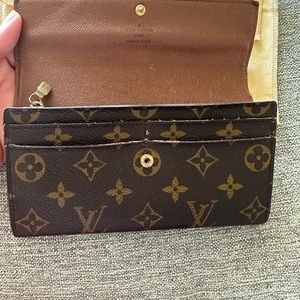 Louis Vuitton Sarah wallets. Good shape showed any wear in pictures.